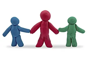 White Studio Environment For Text Drucke: Three plasticine persons over a white background
