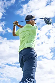 Recreational Golf Activity Drucke: A player playing golf on the golf course