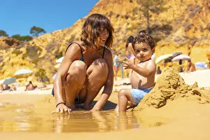 Albufeira Beach Drucke: Playing in the sand with the son
