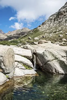 Corsica Waterfall Drucke: Pool with a small waterfall in the mountains