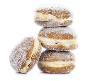 Isolated Dessert Images Drucke: Portion of Berliner Doughnuts isolated on white background (selective focus)