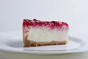 Decorative Still Life Drucke: Portion of cherry cheesecake on a plate