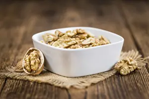 Deciduous Tree Nuts Drucke: Portion of fresh Walnut kernels (close-up shot)