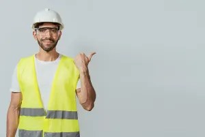 Construction Worker Pointing Drucke: Portrait of engineer man pointing aside