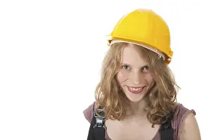 Female Construction Worker Drucke: Portrait of female builder in studio