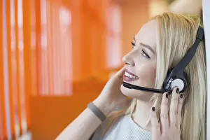 Business Executive Headshot Drucke: Portrait of support phone operator in headset at workplace