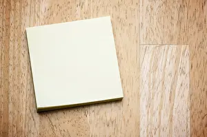 No People Image Drucke: Post it note pad on a wood background
