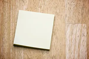 No People Image Drucke: Post it note pad on a wood background