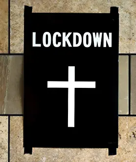 Corona Crisis Drucke: Poster death cross on wall, lockdown