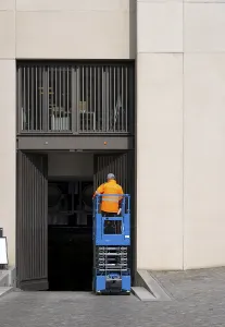 German Construction Industry Drucke: Construction worker with construction machine