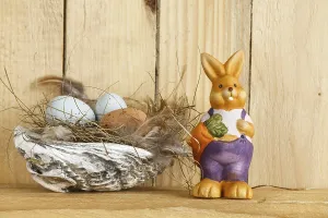 Christian Easter Tradition Drucke: Easter nest from a shell, next to it Easter bunny