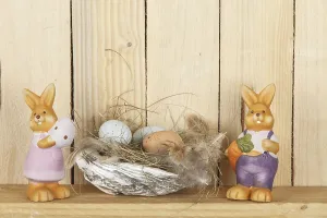 Easter Bunny Figure Drucke: Easter nest from a shell with some eggs