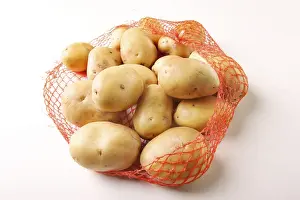 Vegetable Grocery Shopping Drucke: Potatos in a platic package