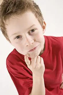 Young Caucasian Male Drucke: Potrait of a boy looking thoughtful