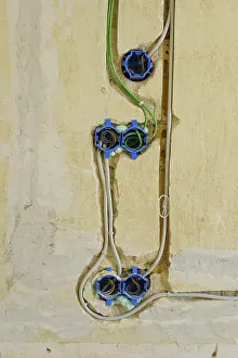 Power Supply Drucke: Power and network cables on a wall