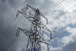 High Voltage Power Pole Drucke: Power pole in front of a cloudy sky