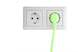 Ecological Conservation Image Drucke: Power socket with a green plug