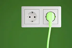 Renewable Energy Symbol Drucke: Power socket with a green plug