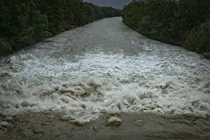 German Federal Republic Rivers Drucke: A powerful river with a strong current under a cloudy sky