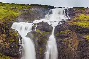 Iceland Waterfall Drucke: Powerful streams of cascade falls with a roar fall in a chasm