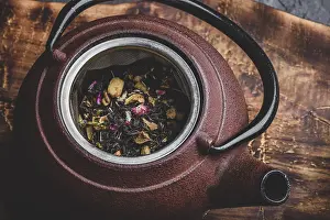 High Angle Kitchen View Drucke: Preparing herbal tea with fruit pieces