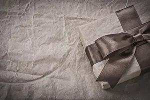 Festive Holiday Concept Image Drucke: Present box on wrapping paper holidays concept
