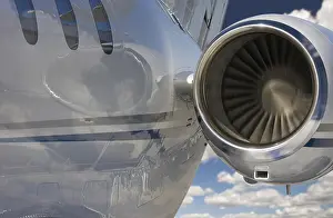 Commercial Aircraft Drucke: Private jet and engine abstract over clouds and sky