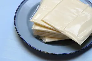 Plastic Wrapped Cheese Drucke: Processed cheese, processed cheese slices packed in plastic