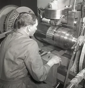 Industrial Building Construction Drucke: Producing postage stamps in the 1950s