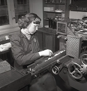 Black And White Factory Scene Drucke: Producing postage stamps in the 1950s