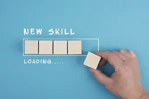 Education Concept Drucke: Progress bar with the words new skill loading