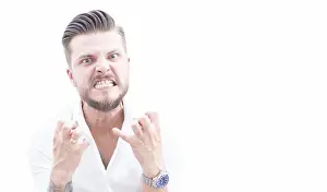 Aggressive Businessman Drucke: The project manager aggressively looks at the camera