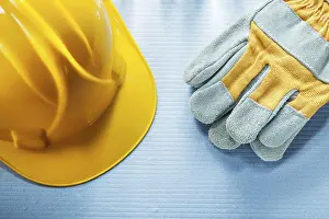Blue Background Studio Shot Drucke: Protective gloves for construction