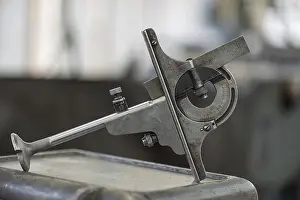 Southern Germany Culture Drucke: Protractor, here used as a gauge for checking the machinist square of conical grooves