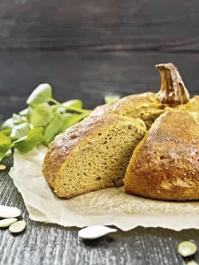 Baked Goods Nutrition Drucke: Pumpkin bread cut on parchment