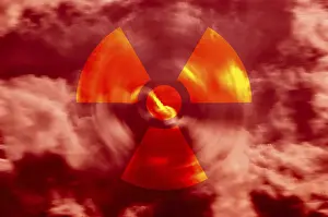 Stormy Atmosphere Drucke: Radioactive symbol in a red sky with clouds