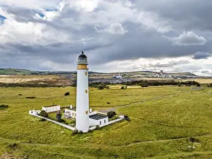 United Kingdom Aerial Views Drucke: Rain Clouds over Barns Ness Lighthouse from a drone