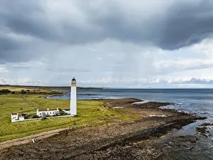 Drone Photography Scotland Drucke: Rain Clouds over Barns Ness Lighthouse from a drone