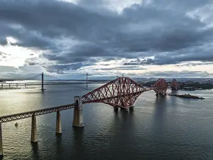 UNESCO World Heritage Site Scotland Drucke: Rain clouds over Forth Bridge from a drone
