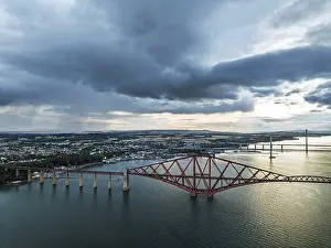 Forth Bridge Scotland Drucke: Rain clouds over Forth Bridge from a drone