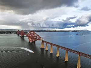 Forth Bridge Scotland Drucke: Rain clouds over Forth Bridge from a drone