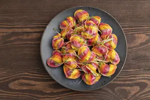 Pepper Filled Dumplings Drucke: Rainbow colored dumplings with pepper