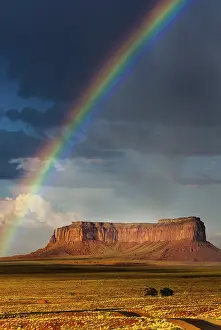Table Mountain Landscape Photography Drucke: Rainbow at Monument Valley, cloudy sky