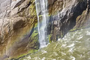 Deserted River Waterfall Scene Drucke: Rainbow on tips at the Orange River waterfall