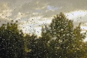 Rainy Evening Atmosphere Drucke: Raindrop on window pane, Germany