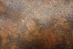 Full Frame Water Surface Drucke: Raindrops on a mixed brown plastic surface
