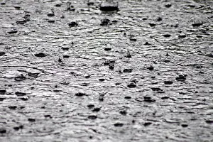 Stormy Weather Conditions Drucke: Raindrops, puddle, water, gray