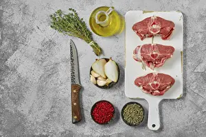 Lamb Butcher Shop Drucke: Raw fresh lamb saddle cut on sections, top view
