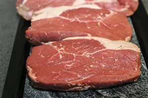 Beef Meat Photography Drucke: Raw roast beef on a platter