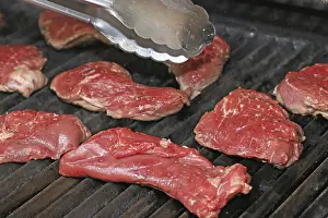 Deserted Barbecue Scene Drucke: Raw steak on the grill